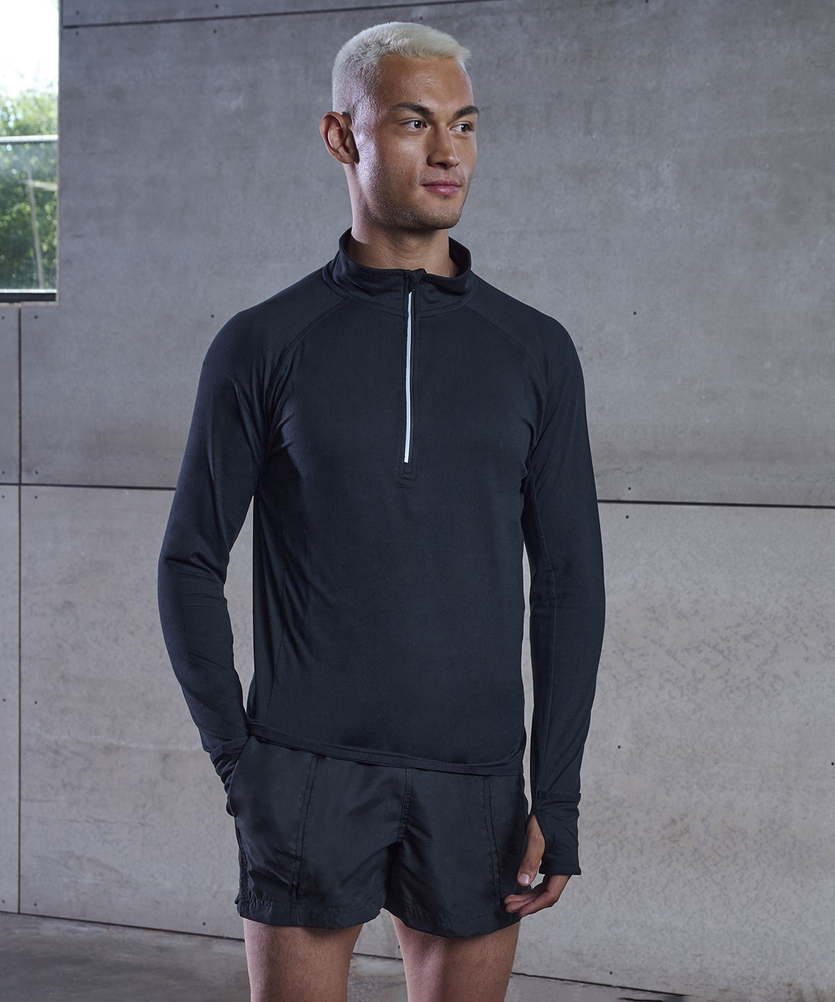 Long-sleeved ¼ zip top